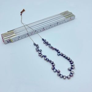 Floating pearls on silk cord